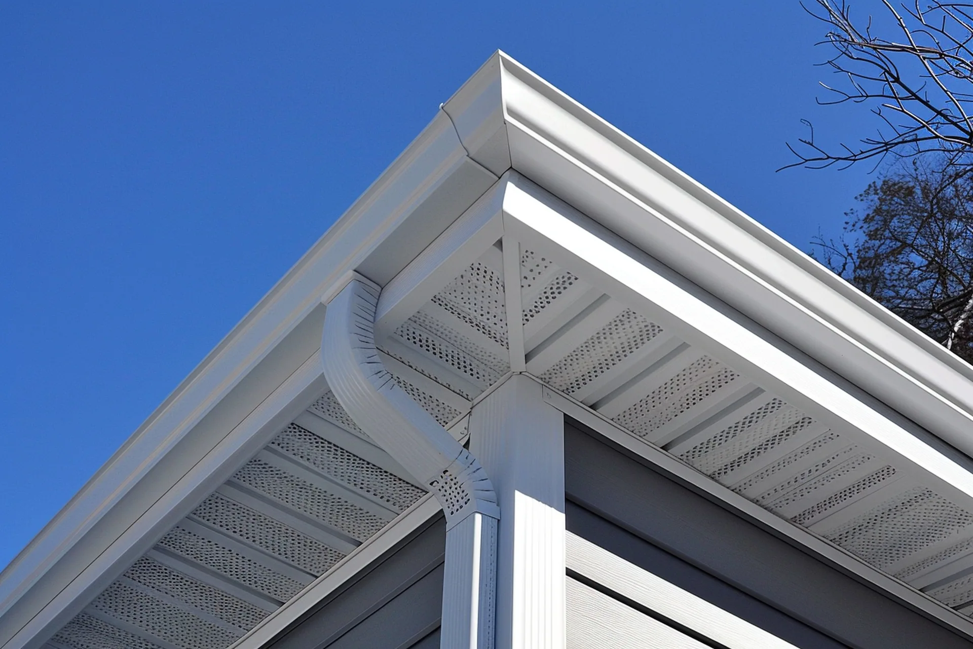 White vinyl soffit gutter downspout corner, Sanford FL